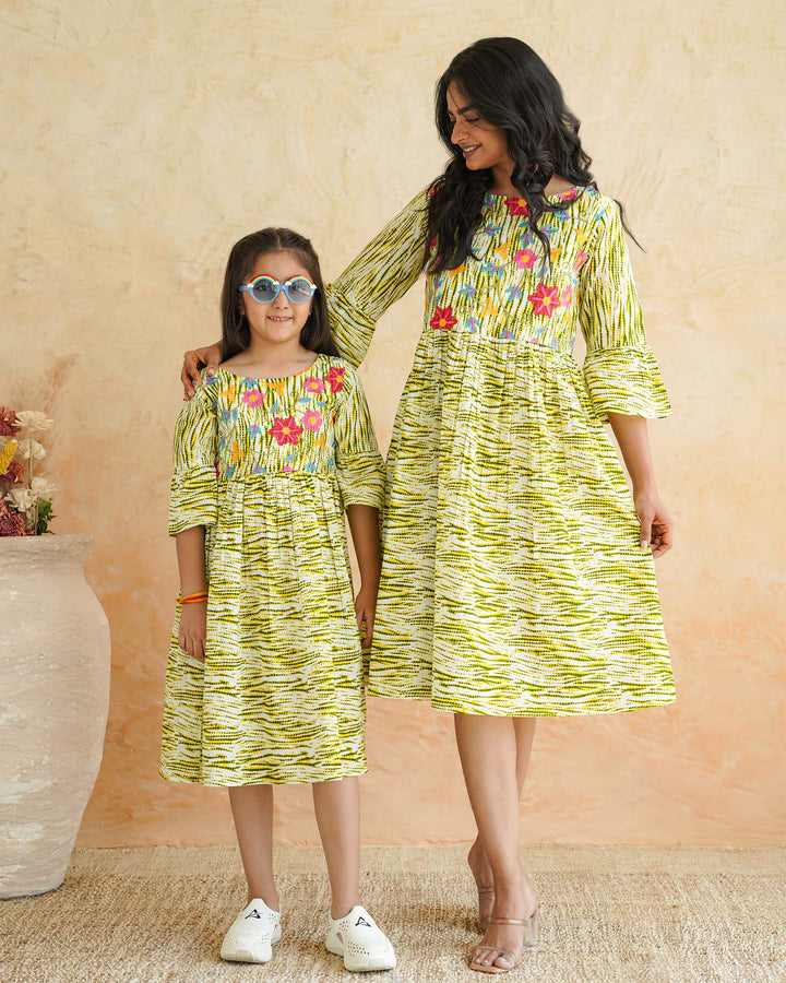 Radiant Floral Whimsy Mom and Daughter Embroidered Dresses